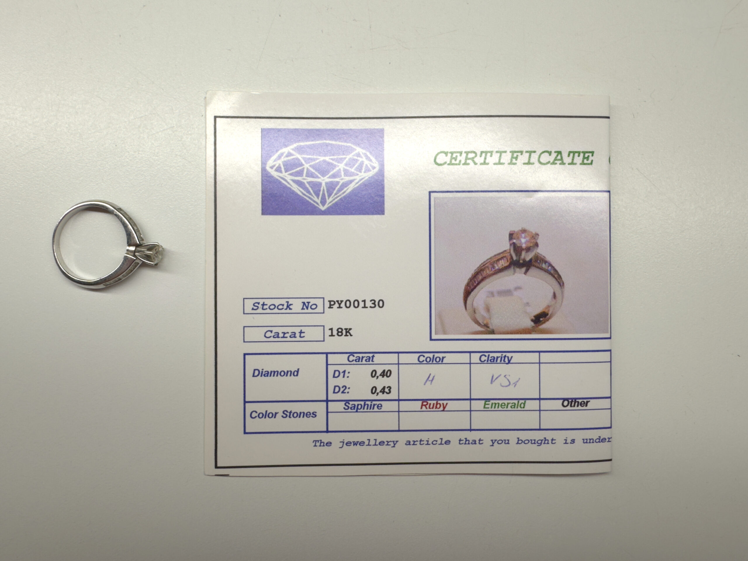 Кольцо белое золото 750 пробы с бриллиантоми