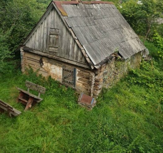 Продается дом- с большим гаражом и с 2-х.эт Баней.