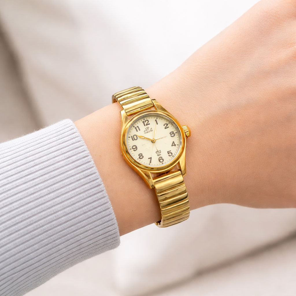 Ceas auriu elegant, luminează noaptea